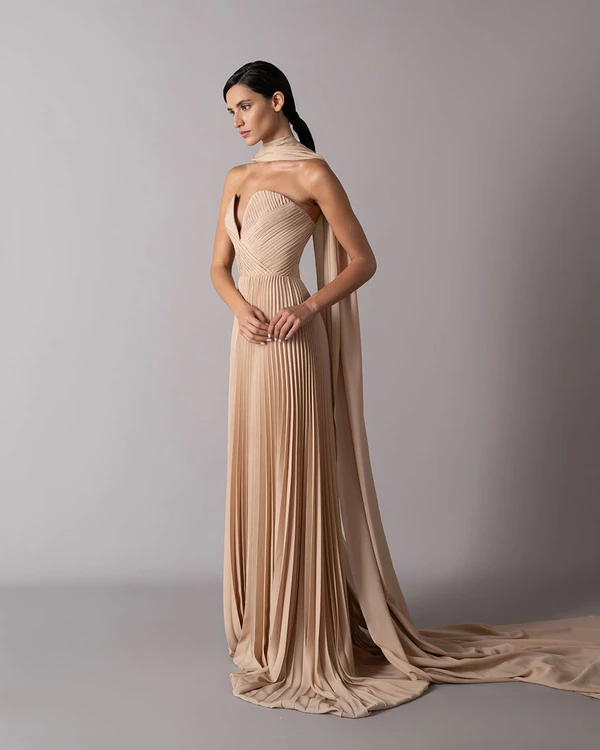 Plunging neckline draped dress