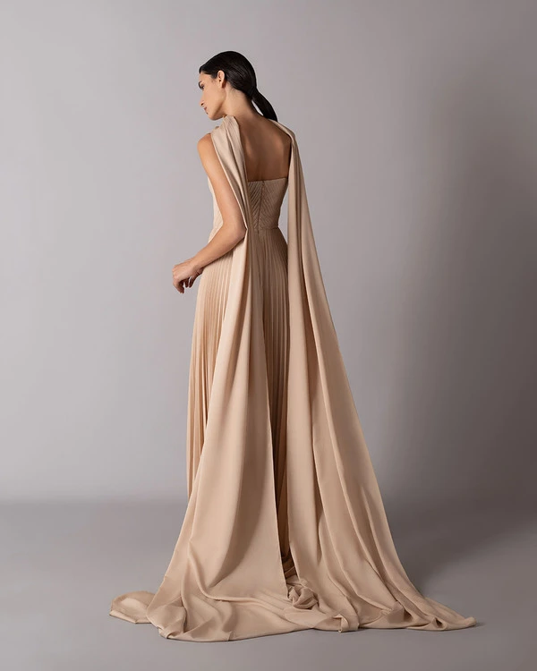 Plunging neckline draped dress